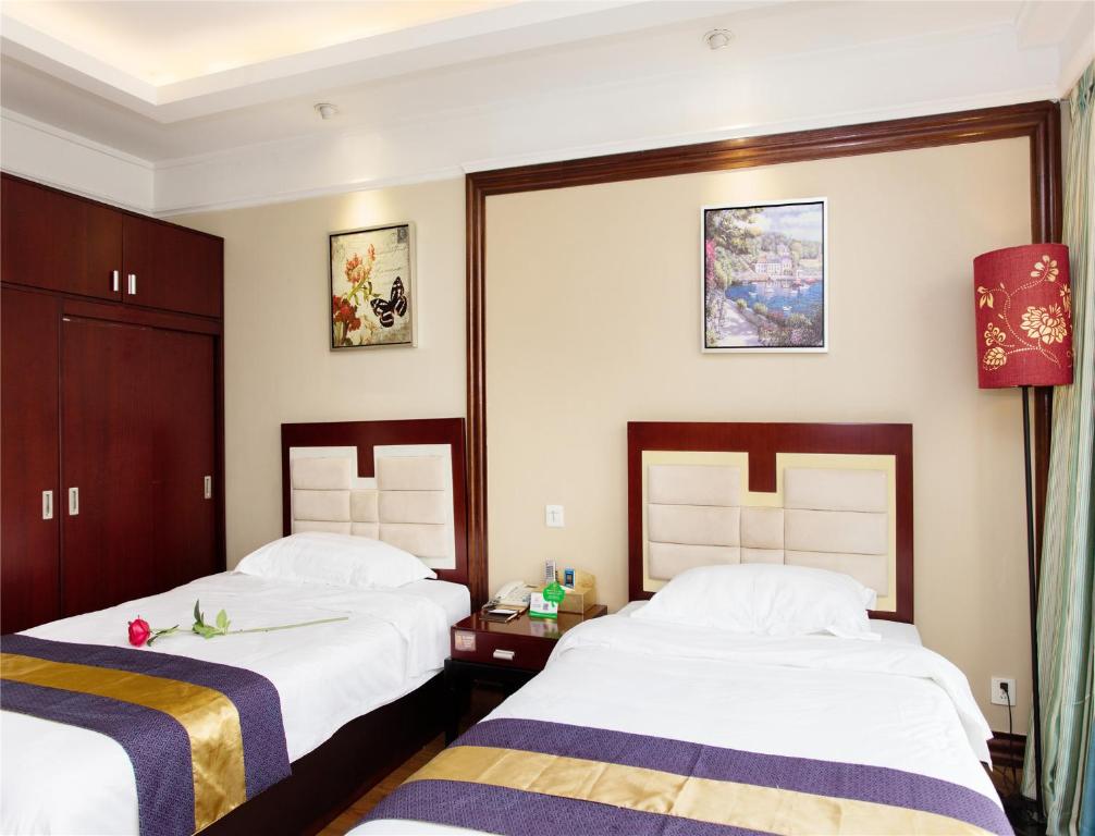 Двухместный (Стандартный двухместный номер с 2 отдельными кроватями) апарт-отеля Nomo Grand Continental Service Apartments-Jinyuan, Гуанчжоу