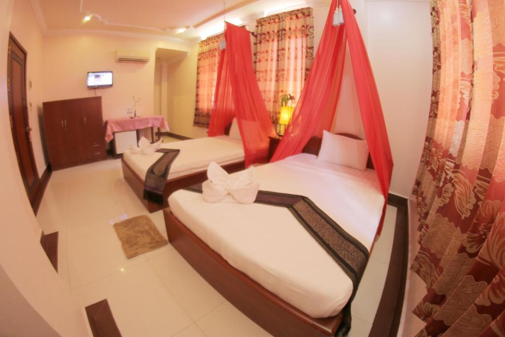 Двухместный (Стандартный двухместный номер с 2 отдельными кроватями) отеля Golden Noura Villa-Pub & Restaurant, Пномпень