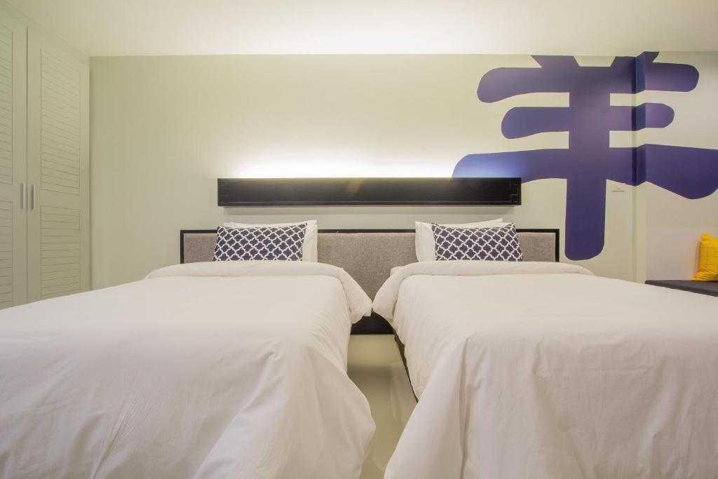Двухместный (Улучшенный двухместный номер с 1 кроватью или 2 отдельными кроватями) отеля Baba House Hotel, Пхукет