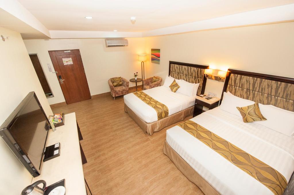Двухместный (Двухместный номер Делюкс с 2 отдельными кроватями) отеля Diamond Suites and Residences, Себу