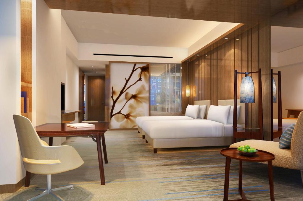 Двухместный (Клубный номер с 2 отдельными кроватями) отеля Hyatt Regency Shanghai Wujiaochang, Шанхай