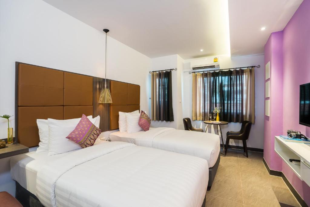 Двухместный (Двухместный номер Делюкс с 2 отдельными кроватями) отеля Aim House Bangkok, Бангкок