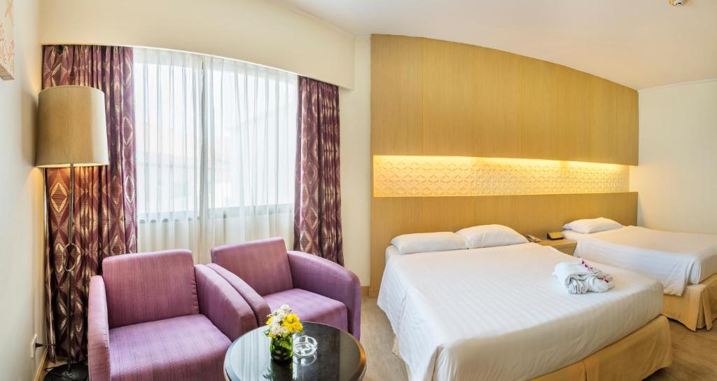 Двухместный (Улучшенный номер с 2 отдельными кроватями - Крыло Palm) отеля Jomtien Palm Beach, Паттайя