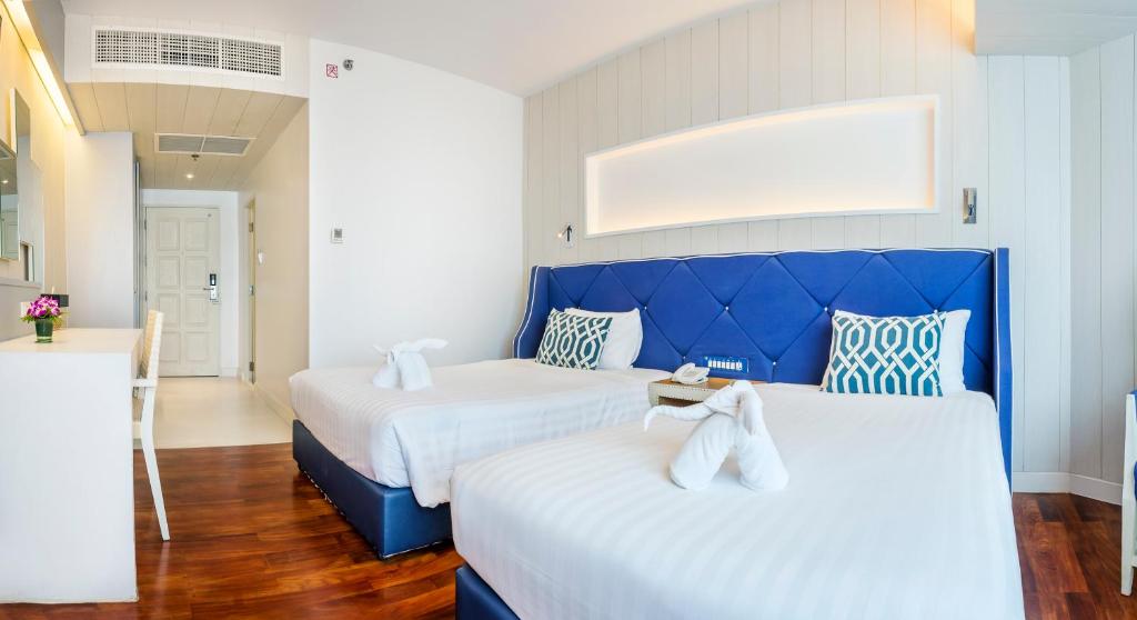 Двухместный (Улучшенный двухместный номер с 2 отдельными кроватями - Крыло Jomtien) отеля Jomtien Palm Beach, Паттайя