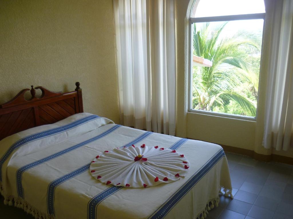 Двухместный (Стандартный двухместный номер с 2 двуспальными кроватями) отеля Hotel Barlovento, Пуэрто-Эскондидо