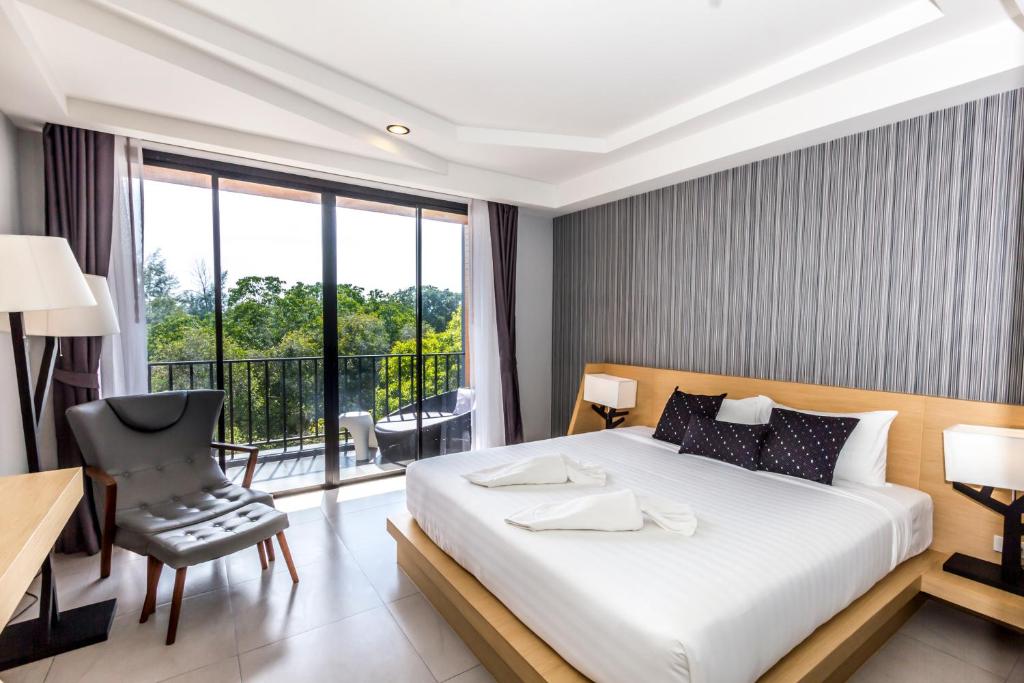 Двухместный (Двухместный номер Делюкс с 1 кроватью или 2 отдельными кроватями и балконом) отеля Apple A Day Resort, Краби