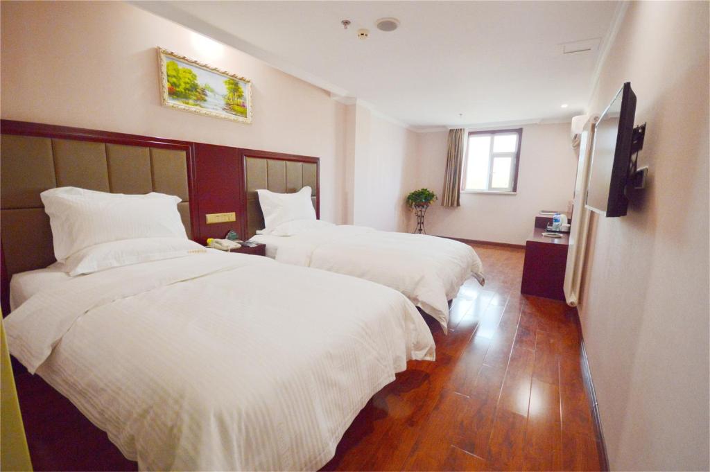 Двухместный (Для граждан материкового Китая - Двухместный номер Делюкс с 2 отдельными кроватями) отеля GreenTree Inn Gansu Lanzhou Yantan High-tech Zone Nanhe Road Business Hotel, Ланьчжоу