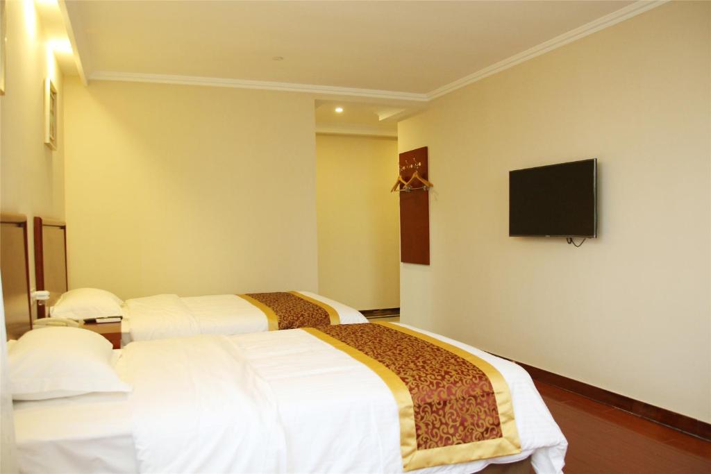 Двухместный (Двухместный номер Делюкс с 2 отдельными кроватями) отеля Jinhua, Иу