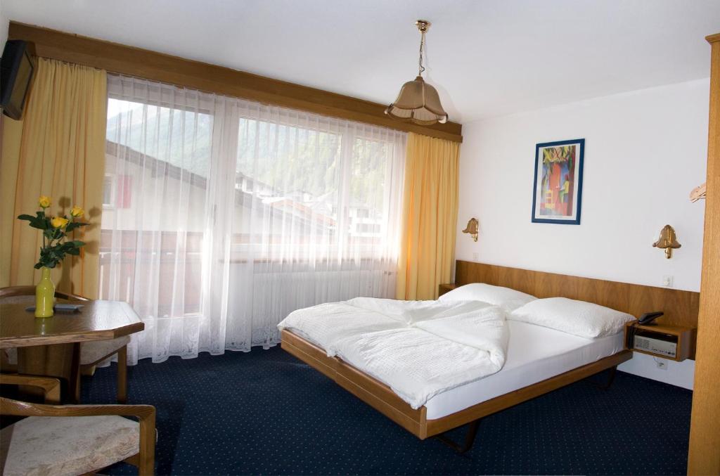 Двухместный (Двухместный номер с 2 отдельными кроватями) отеля Hotel Alpha, Саас-Грунд