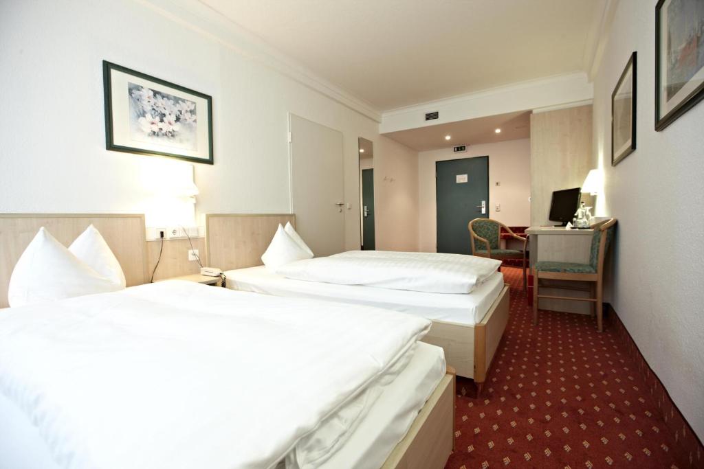 Двухместный (Стандартный двухместный номер с 2 отдельными кроватями) отеля IntercityHotel Schwerin, Шверин