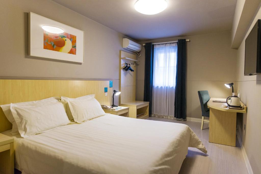 Двухместный (Стандартный двухместный номер В с 2 отдельными кроватями) отеля Jinjiang Inn Foshan Zumiao Qinren Road, Фошань