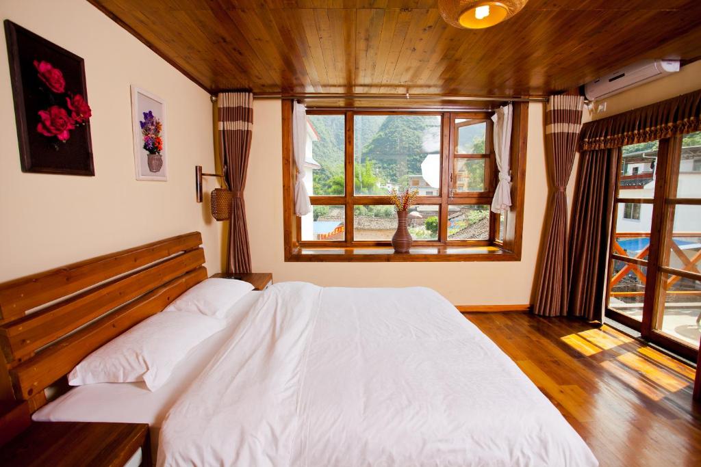 Двухместный (Номер с кроватью размера «queen-size» и балконом), Yangshuo Coco Garden Hotel