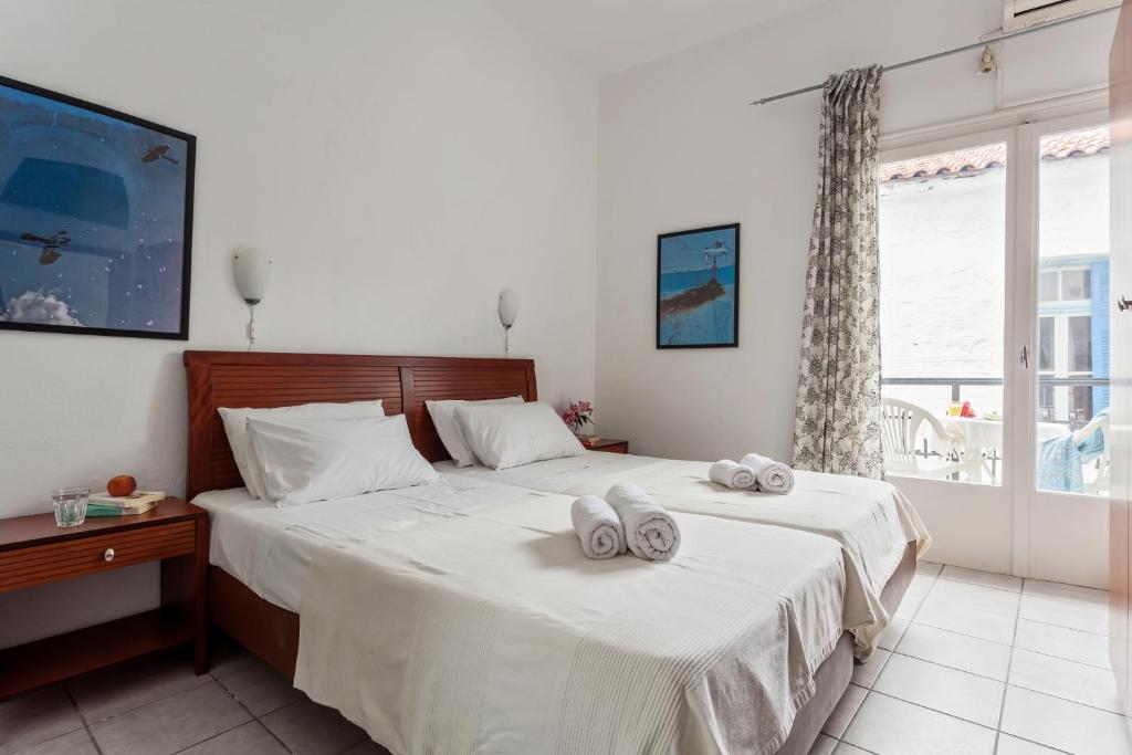 Двухместный (Двухместный номер с 1 кроватью или 2 отдельными кроватями и балконом) гостевого дома Argo, Скиатос