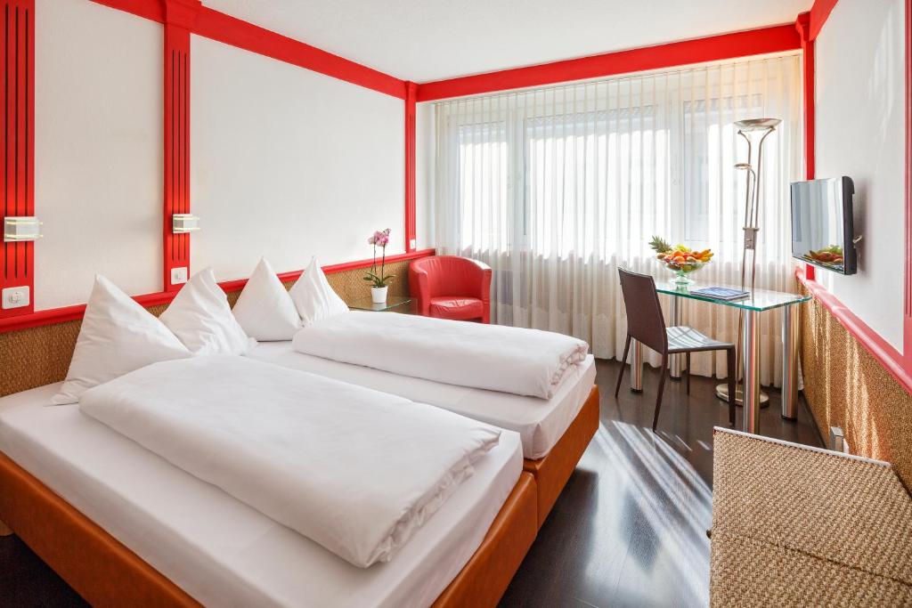 Двухместный (Двухместный номер с 2 отдельными кроватями) отеля Hotel Luzernerhof, Люцерн