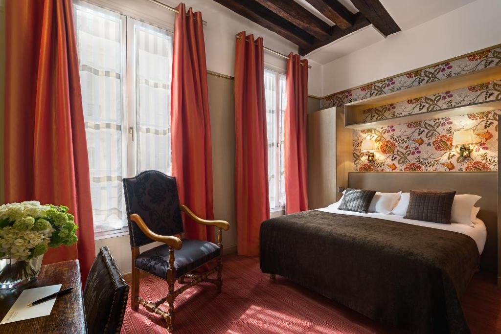 Двухместный (Улучшенный двухместный номер с 1 кроватью) отеля Hôtel Saint-Paul Rive-Gauche, Париж