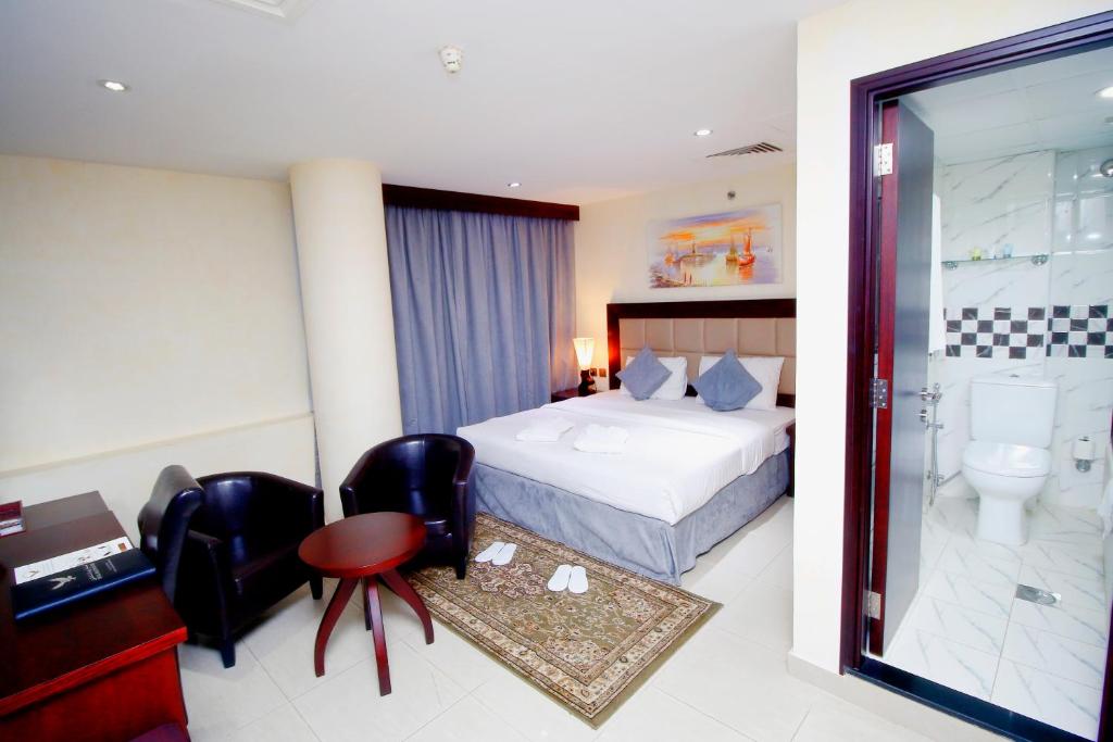 Двухместный (Стандартный двухместный номер с 1 кроватью или 2 отдельными кроватями) отеля Royal Falcon Hotel, Дубай