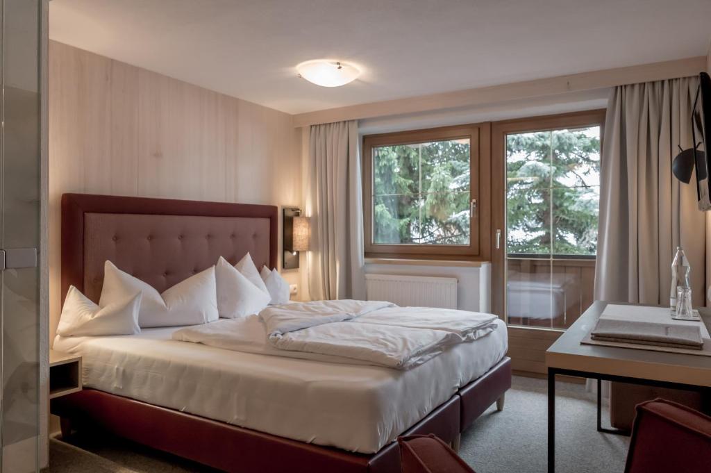Двухместный (Двухместный номер с 1 кроватью и балконом) загородного отеля Landhaus Sepp Santer, Зёльден