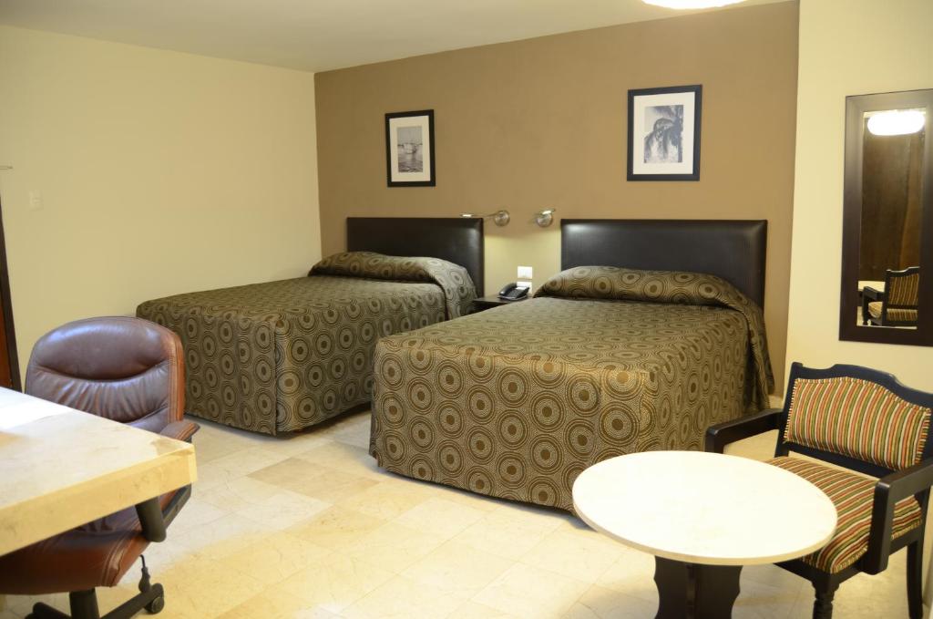 Двухместный (Улучшенный двухместный номер с 2 отдельными кроватями) отеля Hotel Mar y Tierra, Веракрус