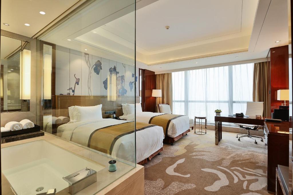 Двухместный (Улучшенный двухместный номер с 2 отдельными кроватями) отеля Minyoun Chengdu Dongda Hotel, Чэнду