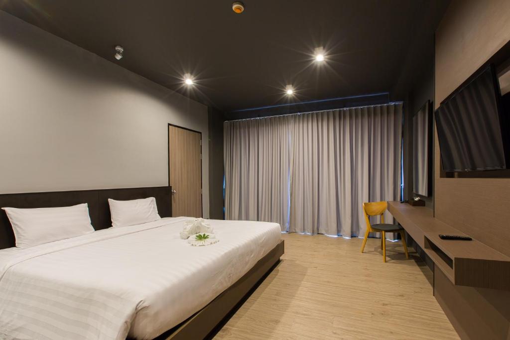 Двухместный (Двухместный номер с 1 кроватью или 2 отдельными кроватями - трансфер из отеля в аэропорт) отеля Maya Phuket, Пхукет