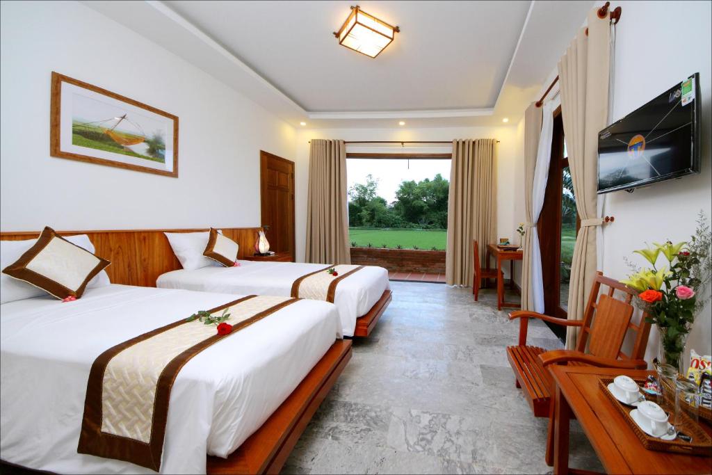 Двухместный (Двухместный номер Делюкс с 2 отдельными кроватями) виллы Lama Homestay - Villa Hoi An, Хойан