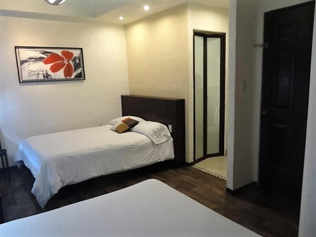 Двухместный (Двухместный номер с 2 двуспальными кроватями) отеля Aztic Hotel and Executive Suites, Мехико