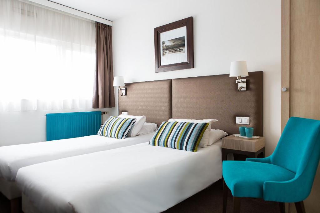 Двухместный (Стандартный двухместный номер с 2 отдельными кроватями) отеля Hotel Lille Europe, Лилль