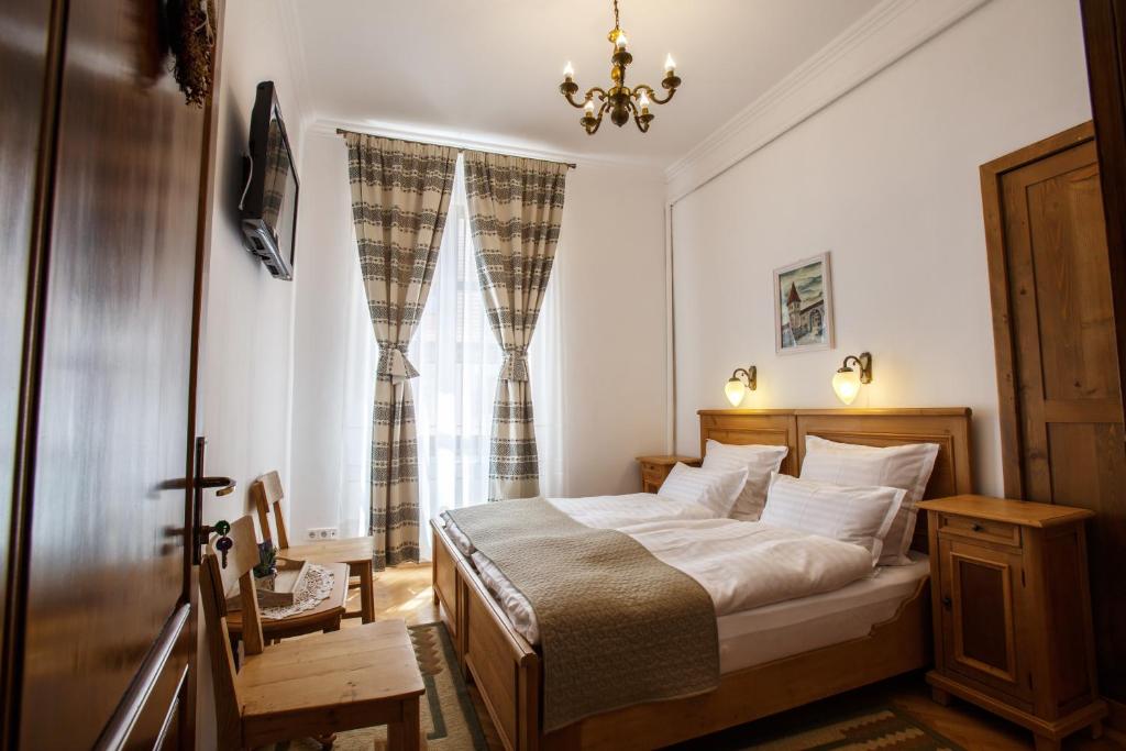 Двухместный (Стандартный двухместный номер с 1 кроватью или 2 отдельными кроватями) гостевого дома Pension Pivnita lui Teo, Сигишоара