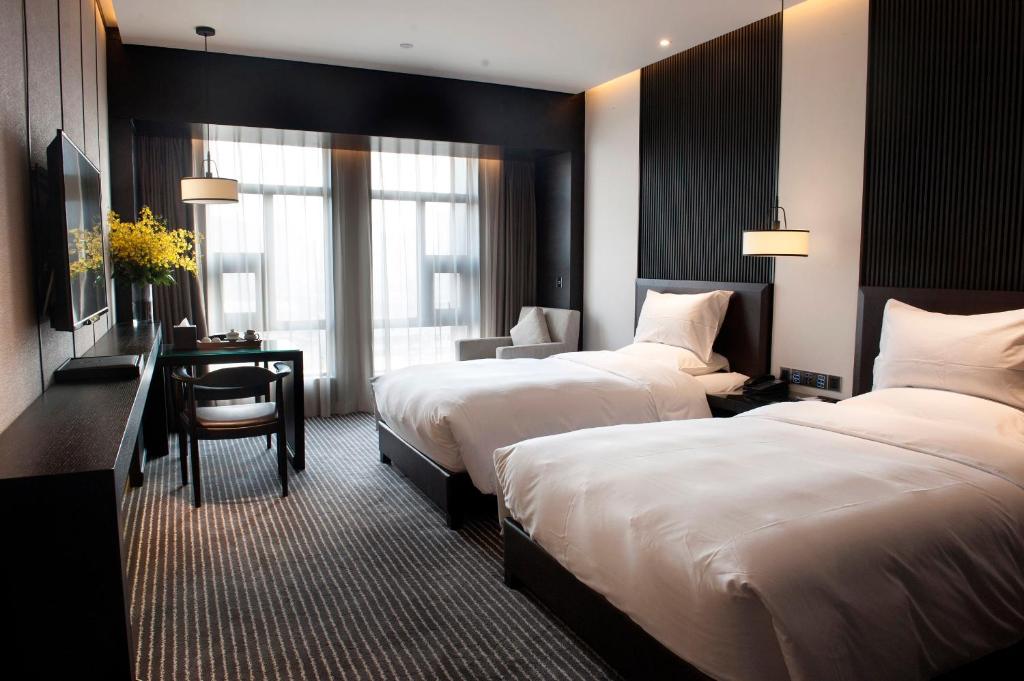 Двухместный (Двухместный номер с 2 отдельными кроватями) отеля Eastern House Boutique Hotel, Сиань