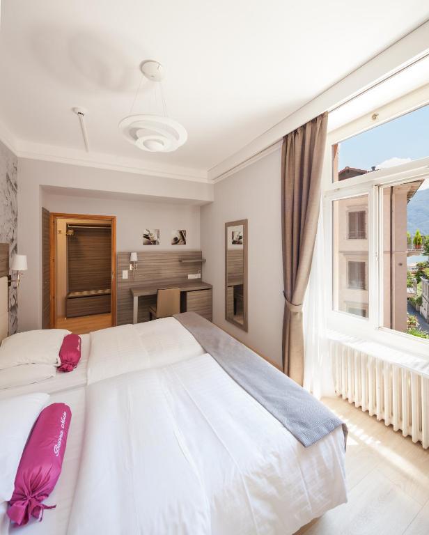 Двухместный (Стандартный двухместный номер с 2 отдельными кроватями) отеля Hotel Federale, Лугано