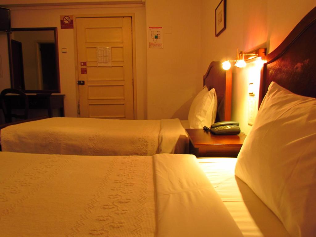 Двухместный (Двухместный номер с 2 отдельными кроватями) отеля Vera Cruz Porto Downtown Hotel, Порту