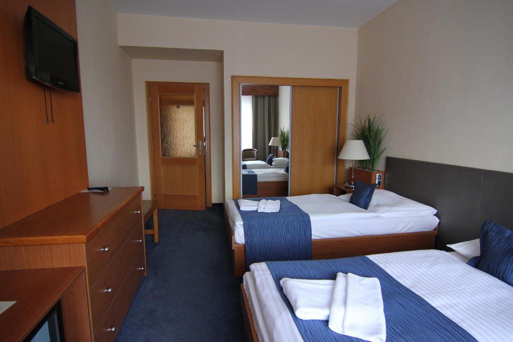 Двухместный (Улучшенный двухместный номер с 1 кроватью или 2 отдельными кроватями) отеля Theresia, Колин