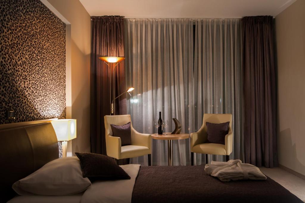 Двухместный (Двухместный номер с 2 отдельными кроватями) отеля Hotel Zoo, Осиек