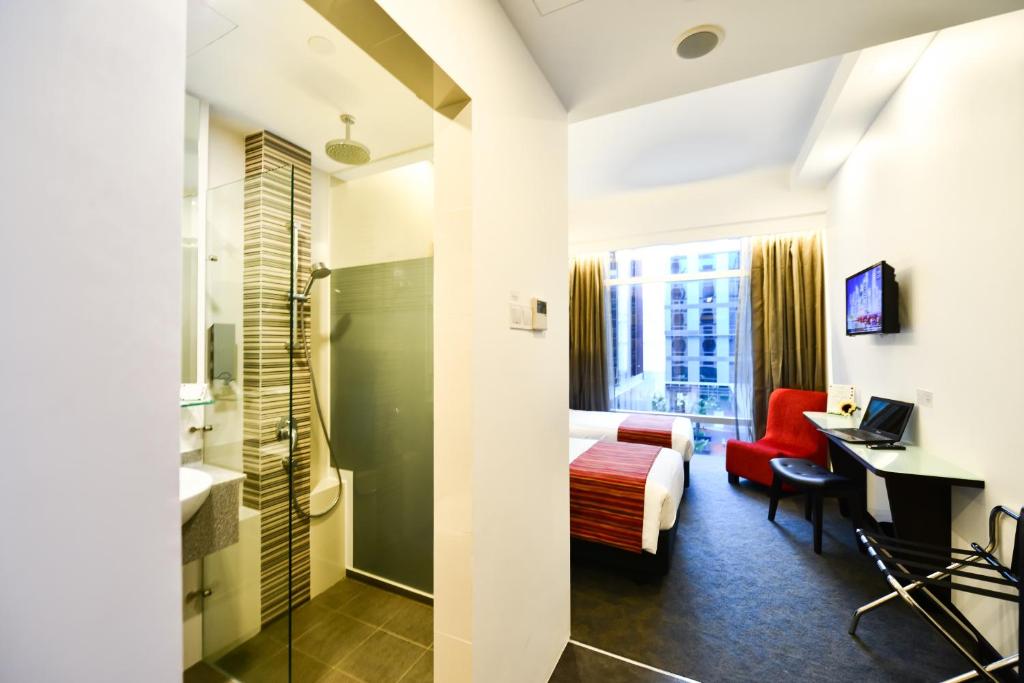 Двухместный (Двухместный номер Делюкс с 1 кроватью или 2 отдельными кроватями) отеля Hotel Chancellor@Orchard, Сингапур (город)