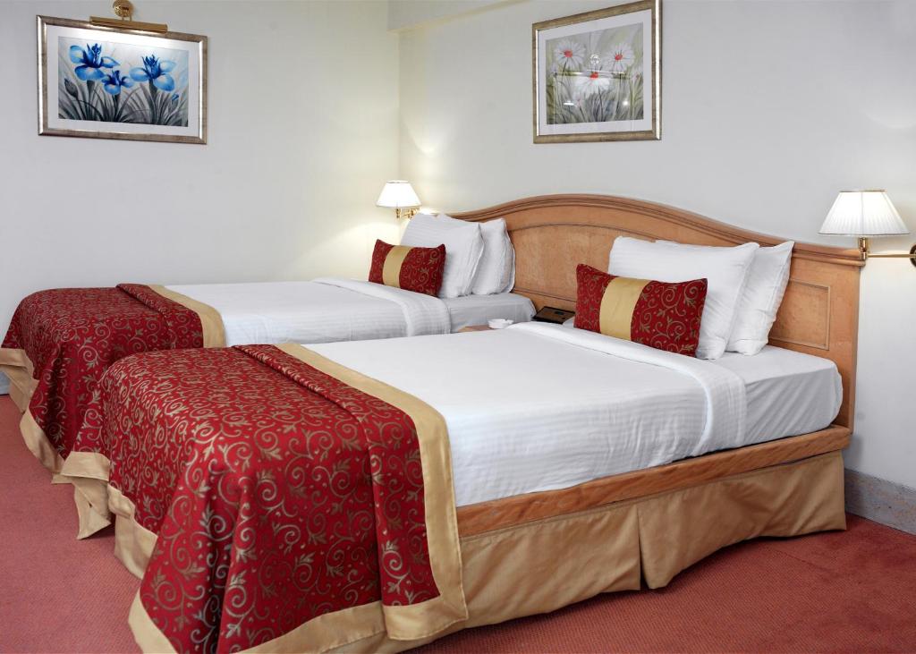 Двухместный (Двухместный номер Делюкс с 1 кроватью) отеля Ramada Plaza Palm Grove, Мумбай
