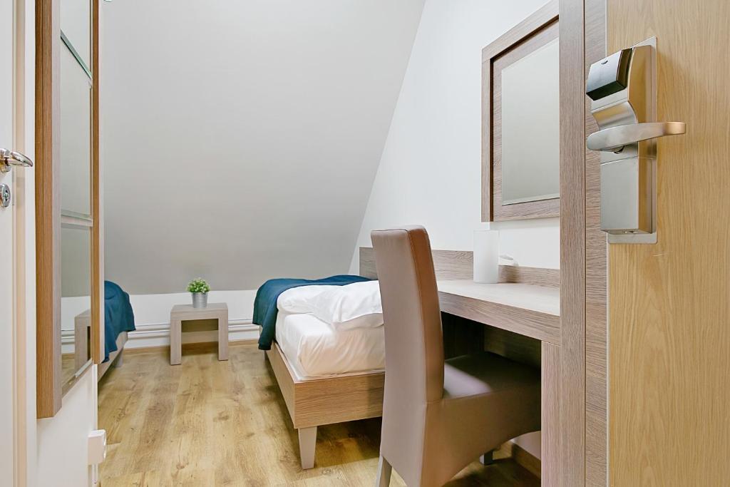 Двухместный (Бюджетный двухместный номер с 2 отдельными кроватями без окон) отеля Hotel Kringelstaden, Стокгольм