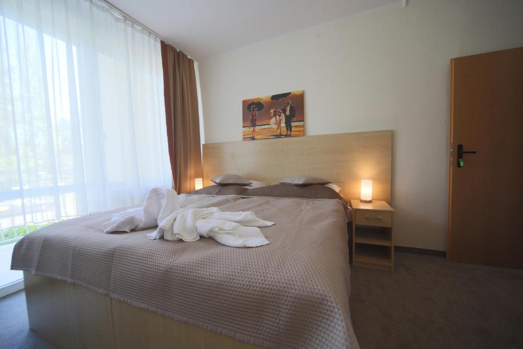Двухместный (Двухместный номер с 1 кроватью или 2 отдельными кроватями) отеля Villa Merry Spa&Wellness, Свиноуйсьце