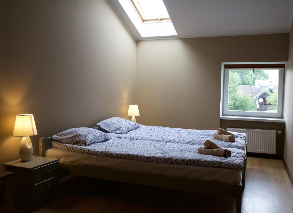 Двухместный (Двухместный номер с 2 отдельными кроватями и общей ванной комнатой) гостевого дома Marbella, Вентспилс