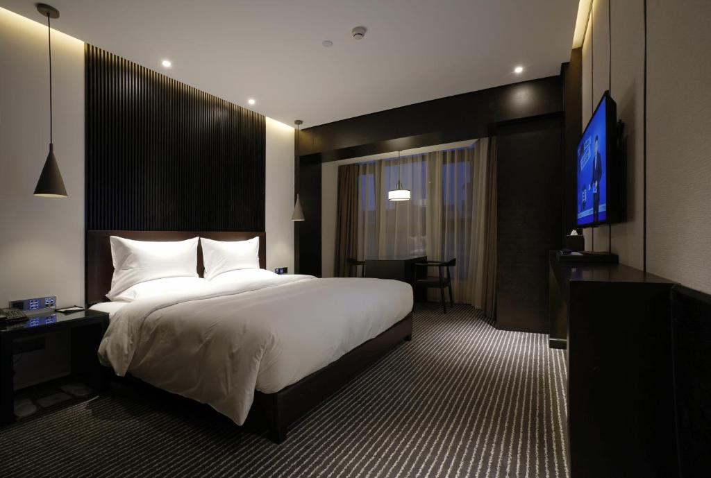 Двухместный (Классический номер с кроватью размера «king-size») отеля Eastern House Boutique Hotel, Сиань