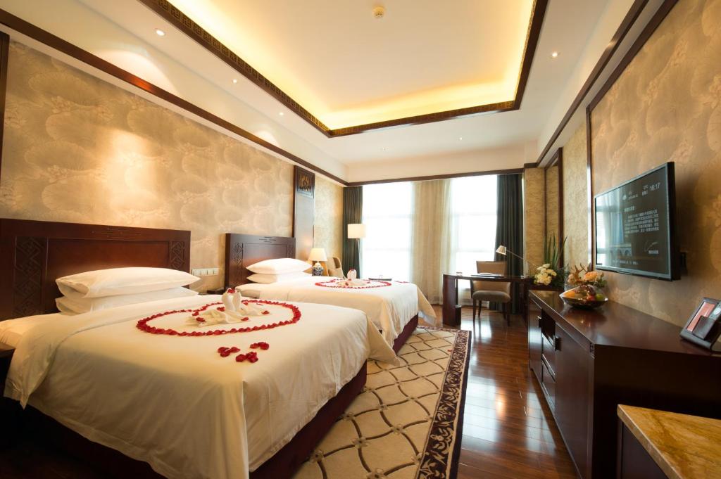 Двухместный (Двухместный номер Делюкс с 2 отдельными кроватями) отеля Huachen International Hotel, Чунцин