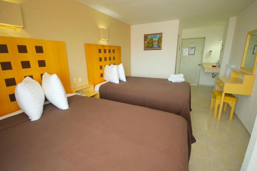 Двухместный (Двухместный номер с 2 двуспальными кроватями) отеля Hotel Posada del Carmen, Веракрус