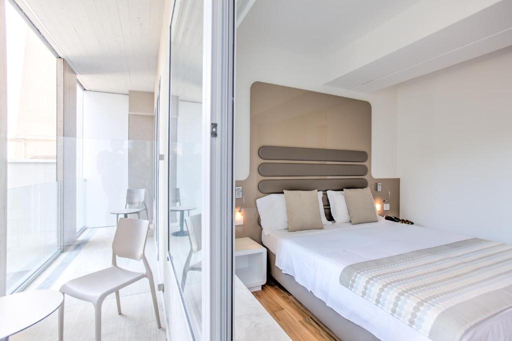 Двухместный (Улучшенный двухместный номер с 1 кроватью или 2 отдельными кроватями и доступом в спа-центр) отеля Mh Florence Hotel & Spa, Флоренция