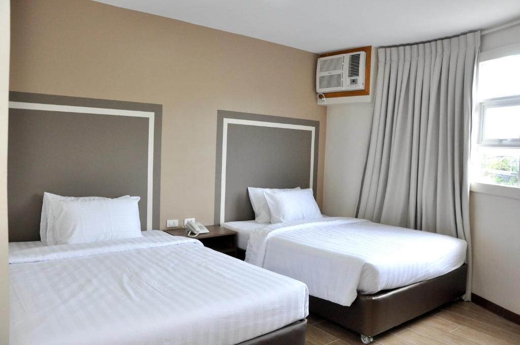 Четырехместный (Роскошный четырехместный номер) отеля S Hotel & Residences, Себу