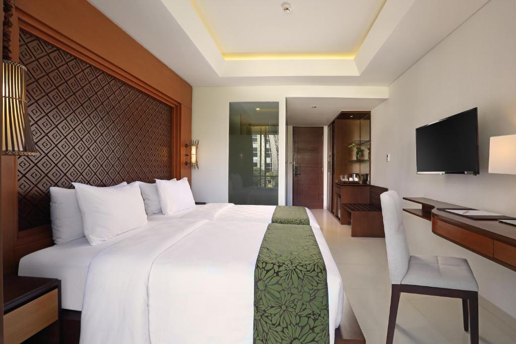 Двухместный (Двухместный номер Делюкс с 2 отдельными кроватями) отеля Golden Tulip Jineng Resort Bali, Кута