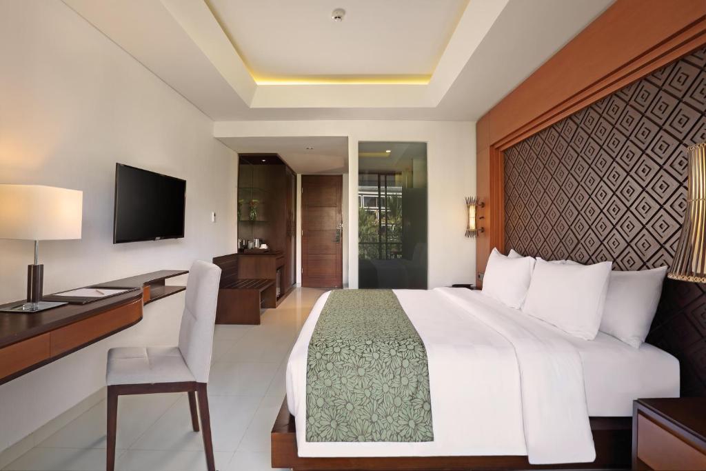 Двухместный (Двухместный номер Делюкс с 1 кроватью или 2 отдельными кроватями, бесплатное предоставление номера более высокой категории — номера Делюкс с видом на бассейн) отеля Golden Tulip Jineng Resort Bali, Кута