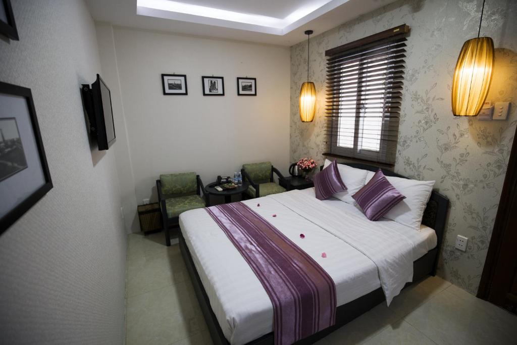 Двухместный (Улучшенный двухместный номер с 1 кроватью или 2 отдельными кроватями) отеля Sense Legend Hotel & Spa, Хошимин