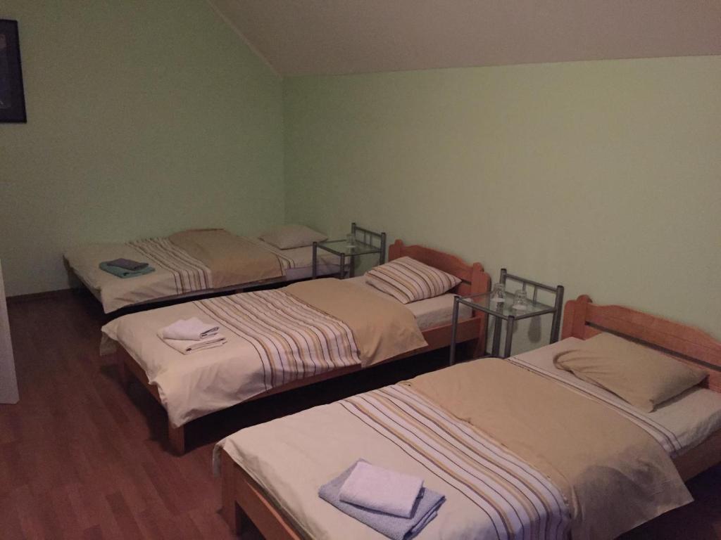 Двухместный (Двухместный номер с 2 отдельными кроватями) отеля Oškrogs, Вецумниеки