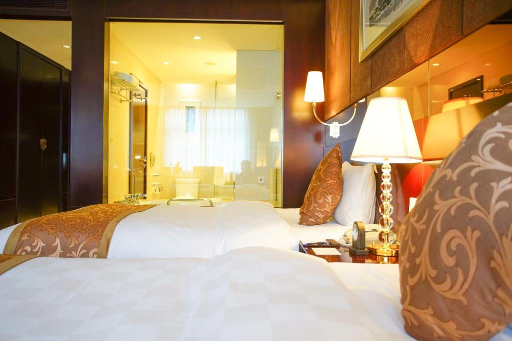 Двухместный (Двухместный номер бизнес-класса с 2 отдельными кроватями) отеля Grand Soluxe Hotel Xi'an, Сиань