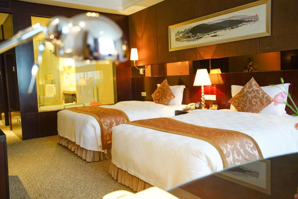 Двухместный (Двухместный номер Делюкс с 2 отдельными кроватями) отеля Grand Soluxe Hotel Xi'an, Сиань