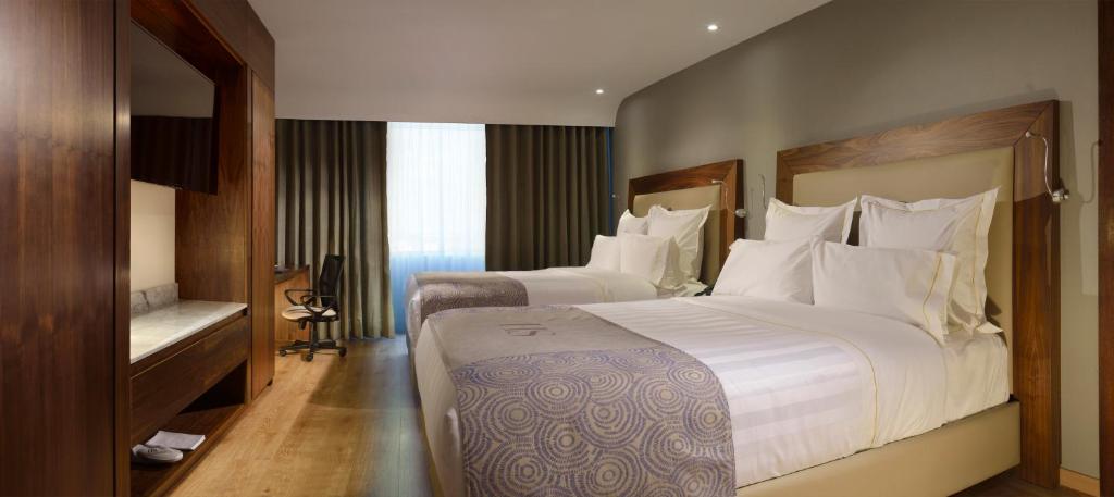 Двухместный (Номер Делюкс с 2 кроватями размера «queen-size») отеля HS HOTSSON Hotel Silao, Силао